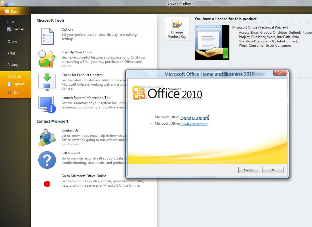 Microsoft Office 2010 Home and Business software package featuring application icons and product details on the box.