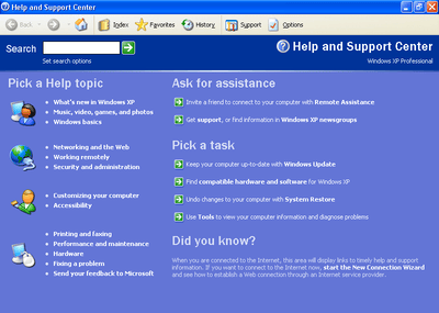 Microsoft Windows XP Professional software box with a blue and green design, featuring the Windows logo prominently.